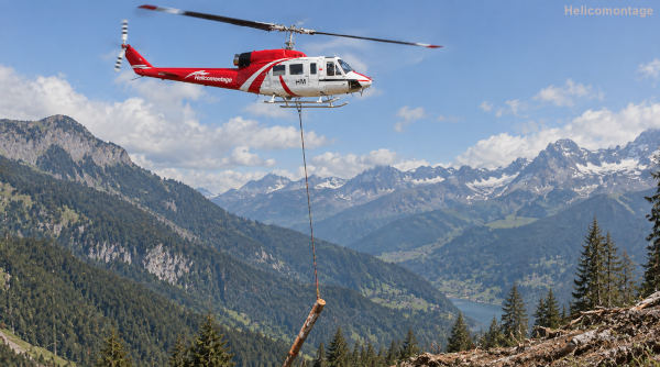 Héliportage hélicoptère Bell 214 transport de charge, sling, levage