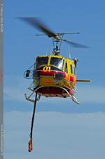 Bell 205 en présentation pour un posé